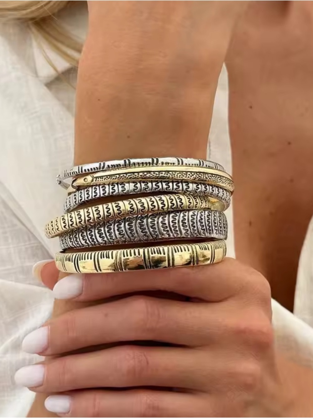 Anthropologie Mixed Metal Textured Bangle Stack in Gold and Silver